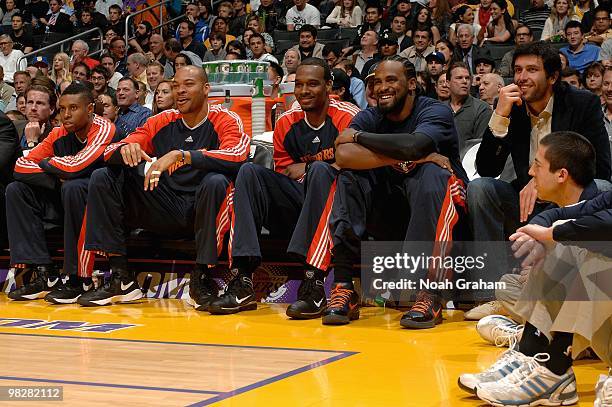 Watson, Devean George, Chris Hunter, Ronny Turiaf and Vladimir Radmanovic of the Golden State Warriors sit on the bench during the game against the...