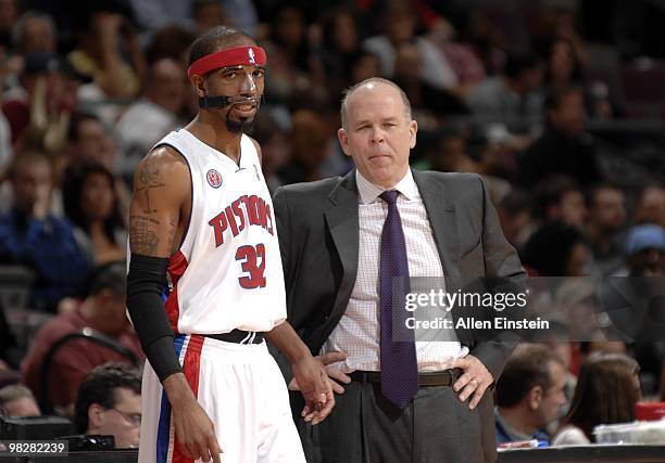 Richard Hamilton and head coach John Kuester of the Detroit Pistons look on from the sidelines during the game against the Cleveland Cavaliers at the...