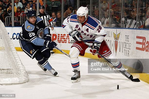 Kamil Kreps of the Florida Panthers tangles with Vinny Prospal of the New York Rangers at the BankAtlantic Center on April 3, 2010 in Sunrise,...