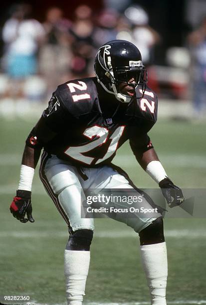 Defensive back Dion Sanders of the Atlanta Falcons plays catches a punt against the Miami Dolphins October 11, 1992 during an NFL football game at...