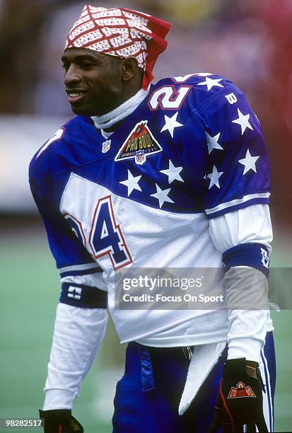 Defensive back Dion Sanders of the San Francisco 49ers on the field during pre-game warm-up February 5, 1995 before the NFL Pro Bowl game between the...