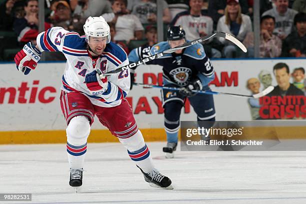 Bryan McCabe of the Florida Panthers skates with the puck against Sidney Crosby of the New York Rangers at the BankAtlantic Center on April 3, 2010...