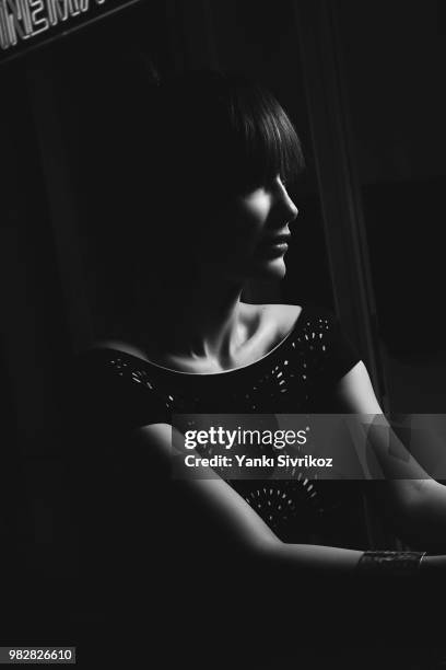 young woman with fringe and obscured face - wonky fringe stock pictures, royalty-free photos & images