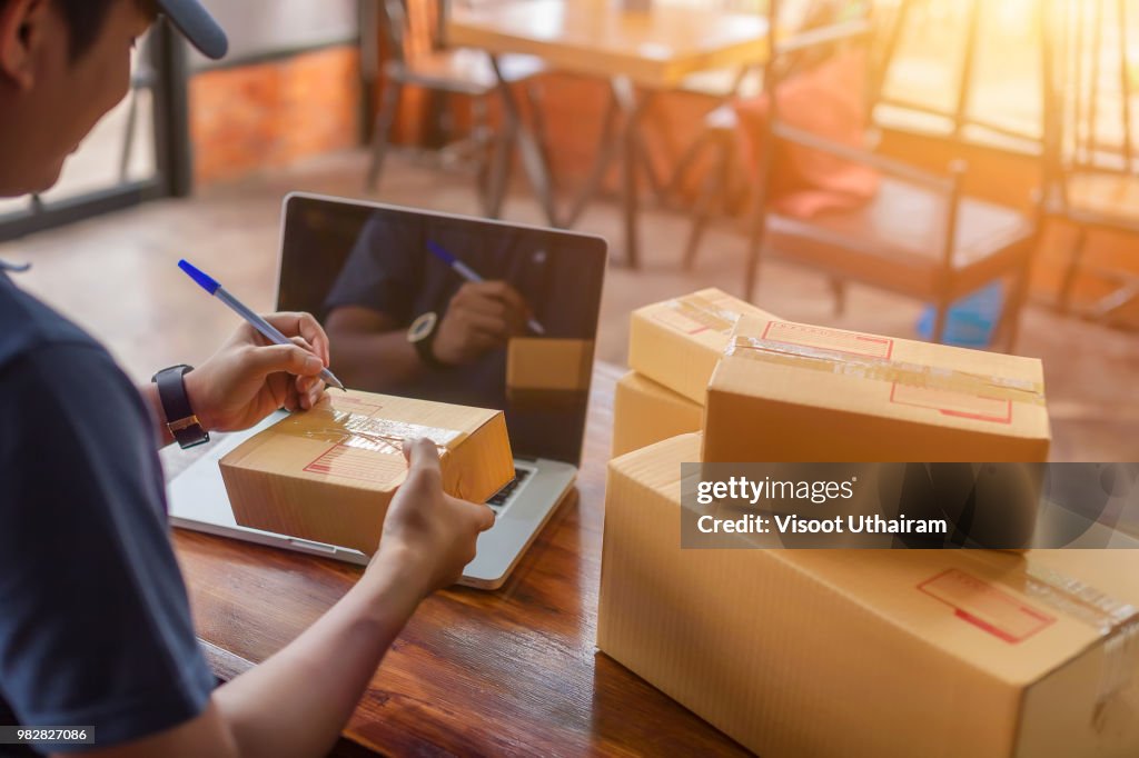 Delivery man are checking to his customer