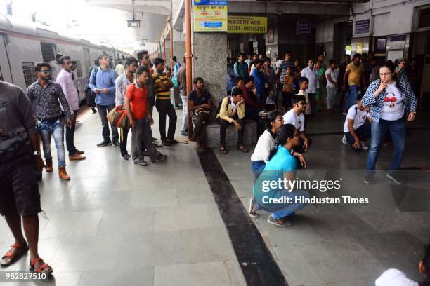Members of Saare Jahaan Se Achcha perform a play to spread awareness on "No spitting" at Pune Railway Station, on June 23, 2018 in Pune, India.