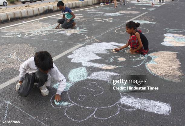 Participants of Raahgiri take part in painting, open gym, bhangra, zumba and other events at Sector 55, 56 Golf Course Road, on June 24, 2018 in...