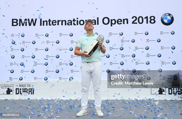 Matt Wallace of England celebrates after winning the BMW International Open at Golf Club Gut Larchenhof on June 24, 2018 in Cologne, Germany.