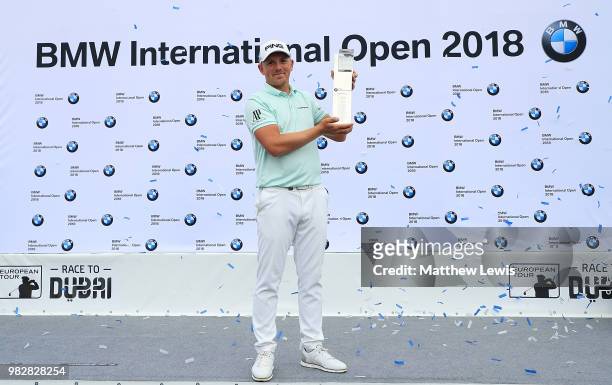 Matt Wallace of England celebrates after winning the BMW International Open at Golf Club Gut Larchenhof on June 24, 2018 in Cologne, Germany.