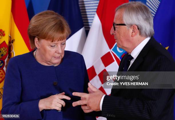 German Chancellor Angela Merkel is welcomed by European Commission President Jean-Claude Juncker ahead of an informal EU summit on migration at the...