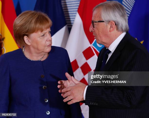 German Chancellor Angela Merkel is welcomed by European Commission President Jean-Claude Juncker ahead of an informal EU summit on migration at the...