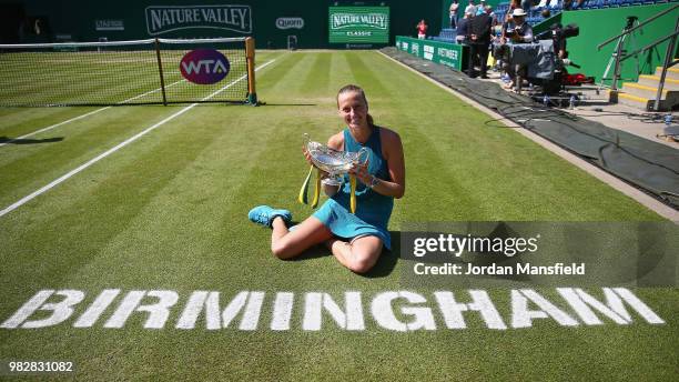 Petra Kvitova of the Czech Republic poses with the Trophy after her singles Final match against Magdalena Rybarikova of Slovakia during day nine of...