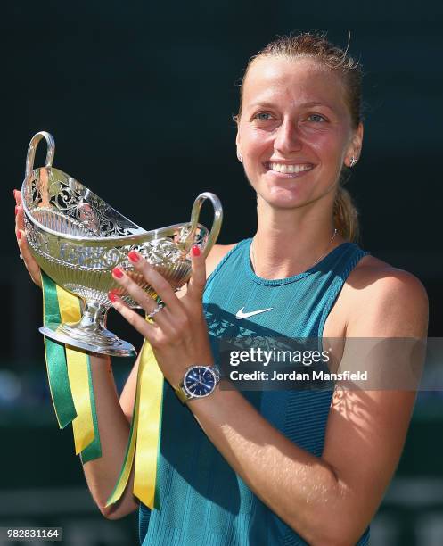 Petra Kvitova of the Czech Republic poses with the Trophy after her singles Final match against Magdalena Rybarikova of Slovakia during day nine of...