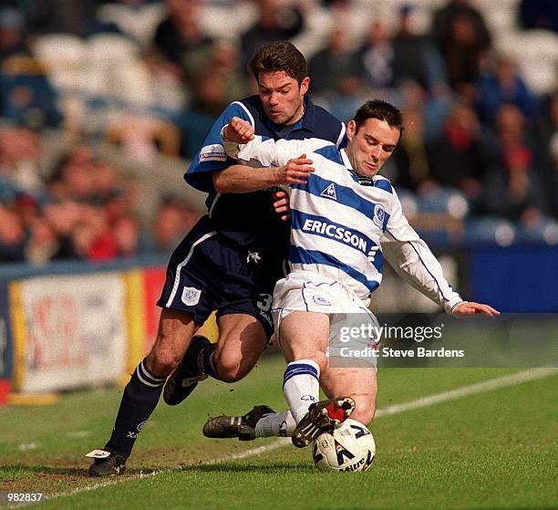 Jeff Kenna of Tranmere and Andy Thompson of QPR in action during the Queens Park Rangers v Tranmere Rovers Nationwide First Division match played at...