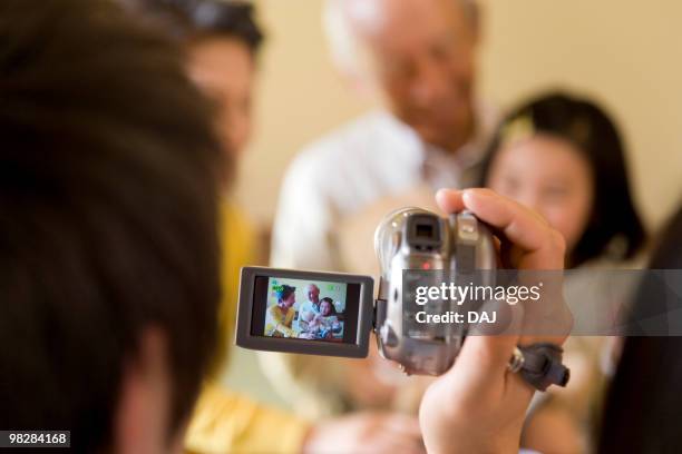 Family Using Filming Camera Daddy Camera Photos and Premium High Res Pictures - Getty Images