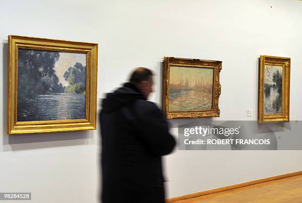 Person visits the exhibition "Impressionism along the Seine" on March 31, 2010 in Giver, as part of the Normandie Impressionniste festival retracing...