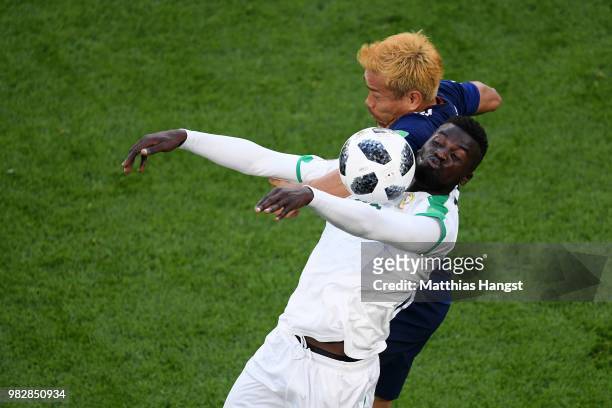 Mbaye Niang of Senegal controls the ball under pressure from Yuto Nagatomo of Japan during the 2018 FIFA World Cup Russia group H match between Japan...