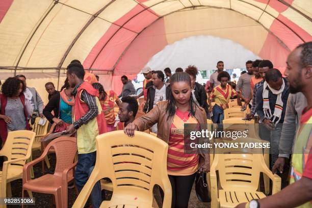 Supporters of Ethiopia's St. George Football Club, one of Addis Ababa's largest football team, prepare to donate blood at Ethiopia Red Cross in Addis...