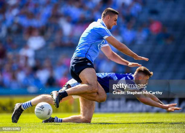 Dublin , Ireland - 24 June 2018; James McCarthy of Dublin has his shot blocked by Trevor Collins of Laois during the Leinster GAA Football Senior...