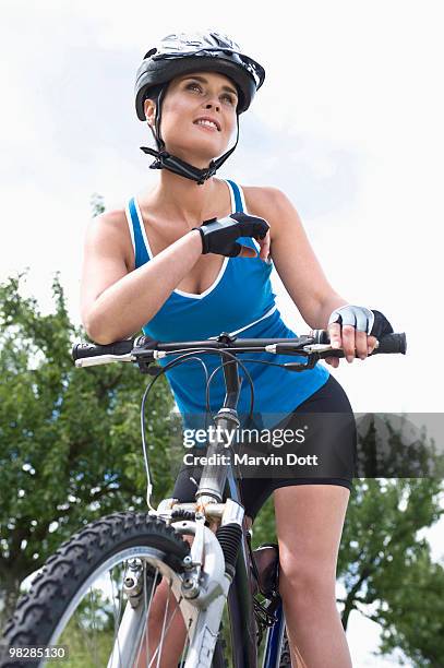 germany, esslingen, woman on bicycle, portrait, close-up - esslingen am neckar stock-fotos und bilder