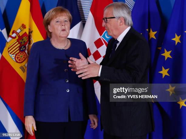 German Chancellor Angela Merkel is welcomed by European Commission President Jean-Claude Juncker ahead of an informal EU summit on migration at the...