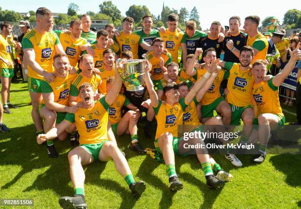 Monaghan , Ireland - 24 June 2018; The Donegal team celebrate with the Anglo Celt Cup after the Ulster GAA Football Senior Championship Final match...