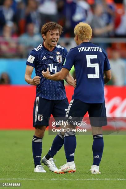 Takashi Inui of Japan celebrates with teammate Yuto Nagatomo after scoring his team's first goal during the 2018 FIFA World Cup Russia group H match...