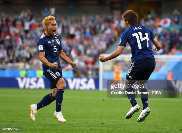 Takashi Inui of Japan celebrates with teammate Yuto Nagatomo after scoring his team's first goal during the 2018 FIFA World Cup Russia group H match...