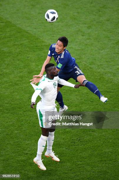 Gen Shoji of Japan wins a header over Mbaye Niang of Senegal during the 2018 FIFA World Cup Russia group H match between Japan and Senegal at...