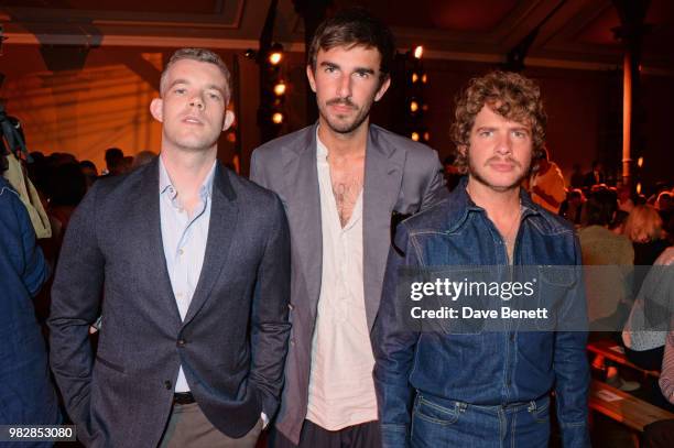 Russell Tovey, wearing Paul Smith, Teo van den Broeke and Luke Day attend the Paul Smith SS19 Menswear Show during Paris Fashion Week at Elysee...