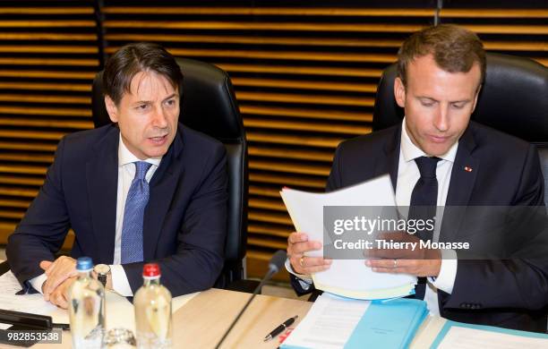 Italian Prime Minister Giuseppe Conte talks with the French President Emmanuel Macron prior an informal working meeting on migration and asylum...