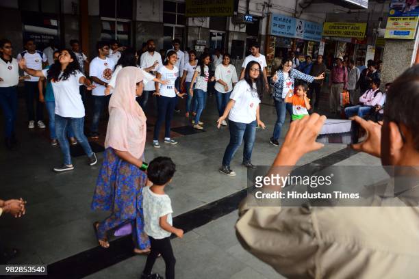Members of Saare Jahaan Se Achcha perform a play to spread awareness on "No Spitting" at Pune Railway Station, on June 23, 2018 in Pune, India.