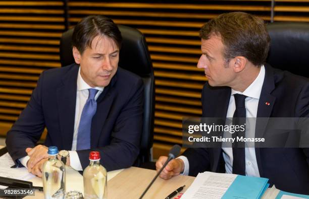Italian Prime Minister Giuseppe Conte talks with the French President Emmanuel Macron prior an informal working meeting on migration and asylum...