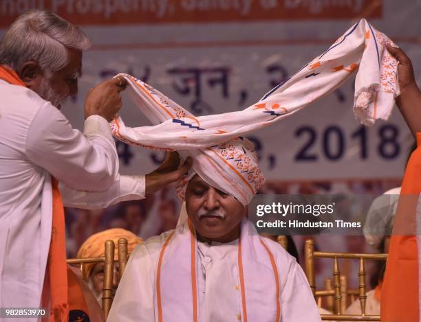 Former Vishwa Hindu Parishad leader Pravin Togadia felicitated by other leaders during the launch of his new outfit International Hindu Council at...