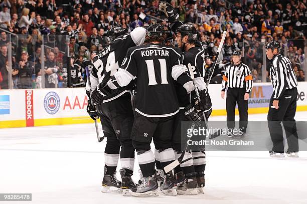 Alexander Frolov, Anze Kopitar and Randy Jones of the Los Angeles Kings celebrate after a goal against the Anaheim Ducks on April 3, 2010 at Staples...