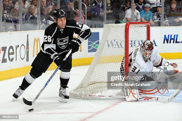 Jarret Stoll of the Los Angeles Kings skates with the puck against Curtis McElhinney of the Anaheim Ducks on April 3, 2010 at Staples Center in Los...