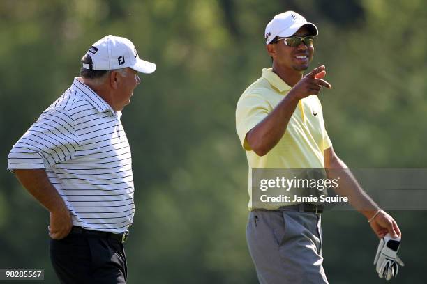 Tiger Woods and Mark O'Meara walk together during a practice round prior to the 2010 Masters Tournament at Augusta National Golf Club on April 6,...