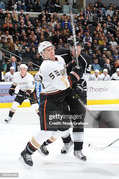 Brett Festerling of the Anaheim Ducks collides with Fredrik Modin of the Los Angeles Kings on April 3, 2010 at Staples Center in Los Angeles,...