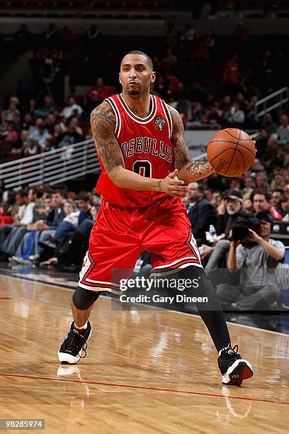 Acie Law of the Chicago Bulls handles the ball against the Miami Heat during the game on March 25, 2010 at the United Center in Chicago, Illinois....