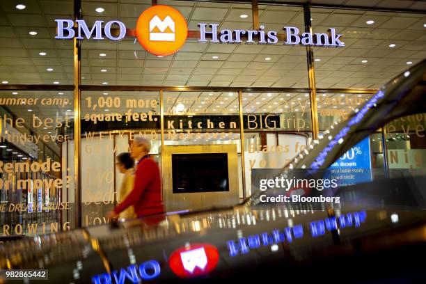 Pedestrians walk outside a BMO Harris Bank branch in the ground floor of the US Headquarters building in Chicago, Illinois, U.S., on Monday, June 11,...