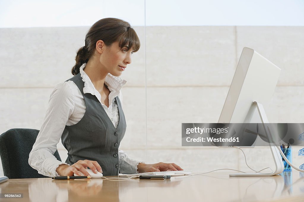 Young woman working in office