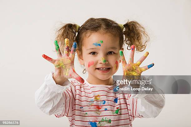 girl (2-3) with paint on hands - children drawing white background bildbanksfoton och bilder