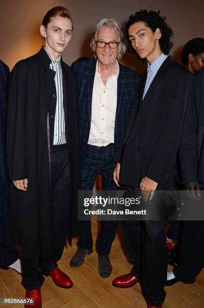 Sir Paul Smith poses with models backstage at the Paul Smith SS19 Menswear Show during Paris Fashion Week at Elysee Montmartre on June 24, 2018 in...