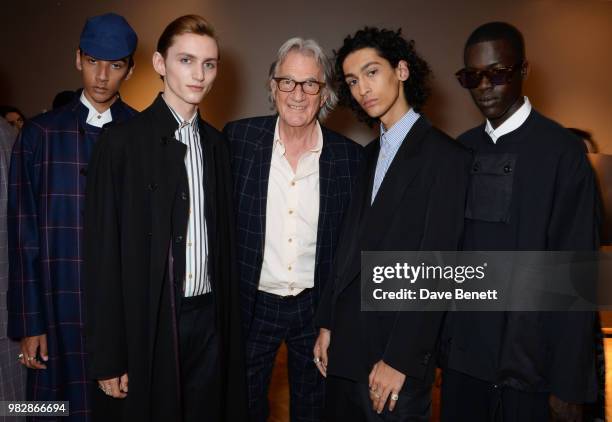 Sir Paul Smith poses with models backstage at the Paul Smith SS19 Menswear Show during Paris Fashion Week at Elysee Montmartre on June 24, 2018 in...