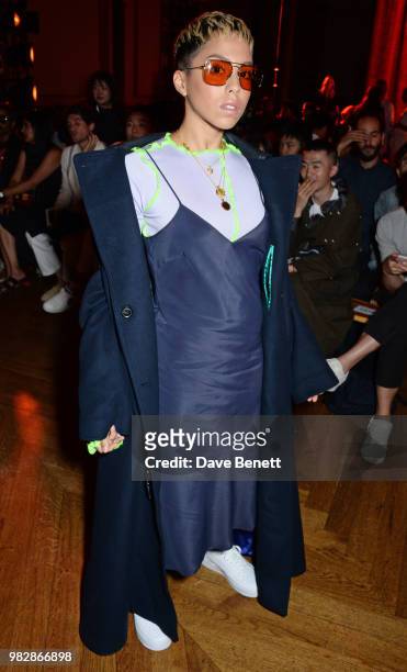 Poppy Ajudha, wearing Paul Smith, attends the Paul Smith SS19 Menswear Show during Paris Fashion Week at Elysee Montmartre on June 24, 2018 in Paris,...