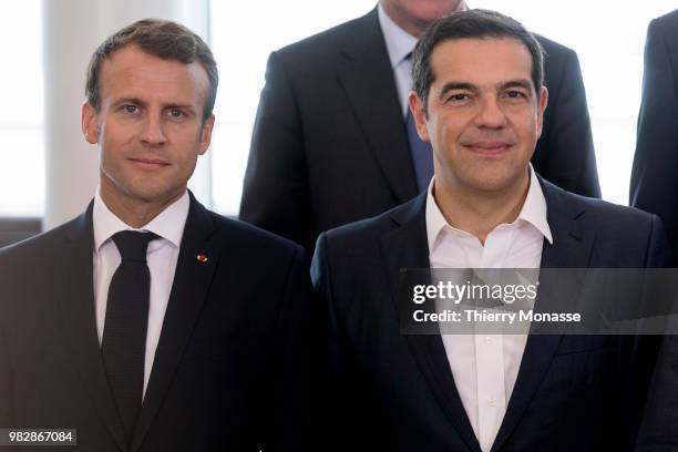 French President Emmanuel Macron and Greece Prime Minister Alexis Tsipras pose for a group photo prior an informal working meeting on migration and...