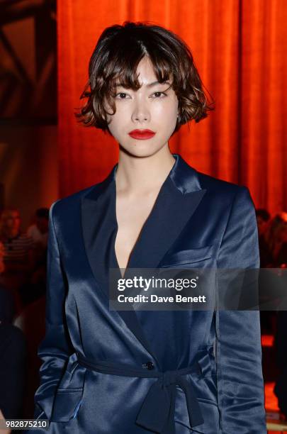 Hikari Mori, wearing Paul Smith, attends the Paul Smith SS19 Menswear Show during Paris Fashion Week at Elysee Montmartre on June 24, 2018 in Paris,...