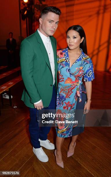 Colton Haynes and Ally Maki, both wearing Paul Smith, attend the Paul Smith SS19 Menswear Show during Paris Fashion Week at Elysee Montmartre on June...