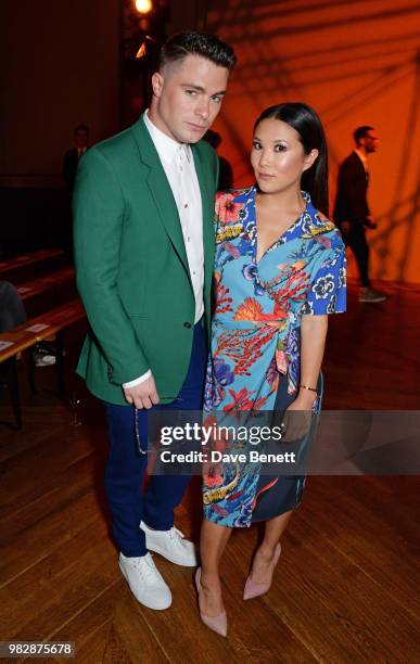 Colton Haynes and Ally Maki, both wearing Paul Smith, attend the Paul Smith SS19 Menswear Show during Paris Fashion Week at Elysee Montmartre on June...