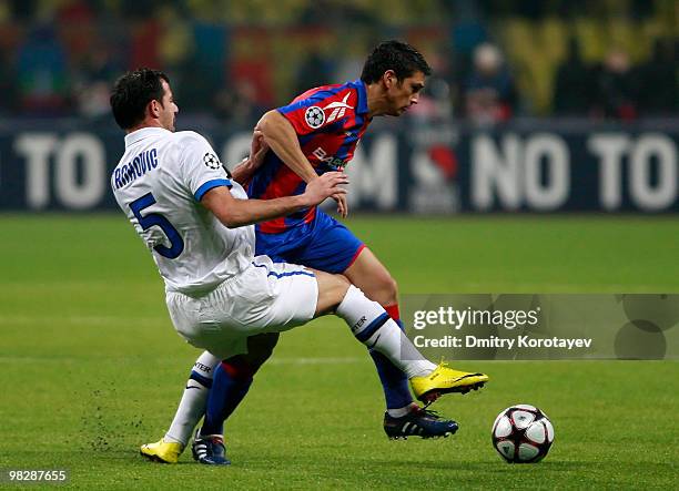 Mark Gonzalez of CSKA Moscow battles for the ball with Dejan Stankovic of FC Internazionale Milano during the UEFA Champions League Quarter Finals,...