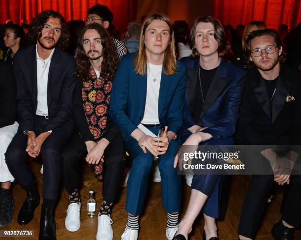 Charlie Salt, Josh Dewhurst, Myles Kellock, Tom Ogden and Joe Donovan of Blossoms, all wearing Paul Smith, attend the Paul Smith SS19 Menswear Show...